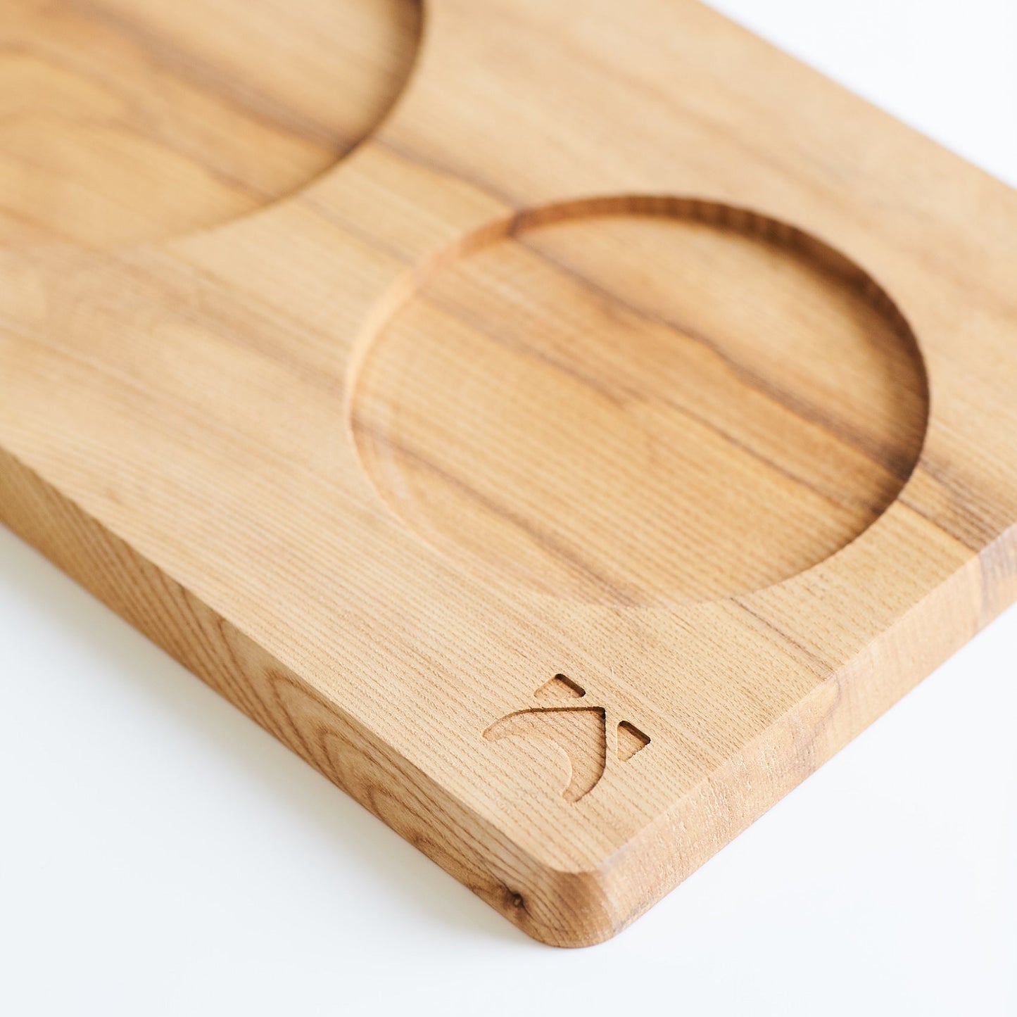 Light oak dog bowl tray on a white background