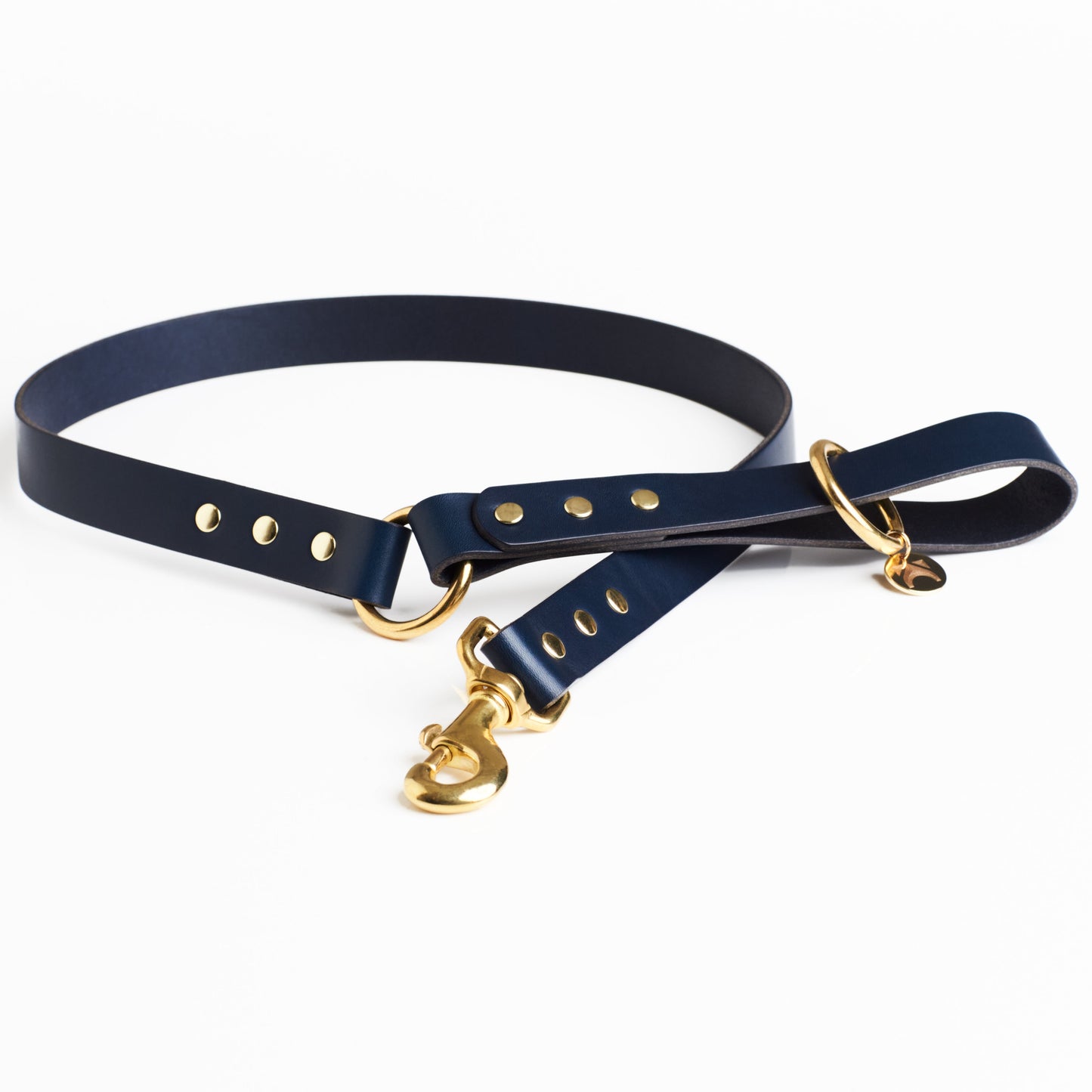 Midnight Blue Leather Dog Lead with solid brass hardware and a connecting brass O ring against a white background