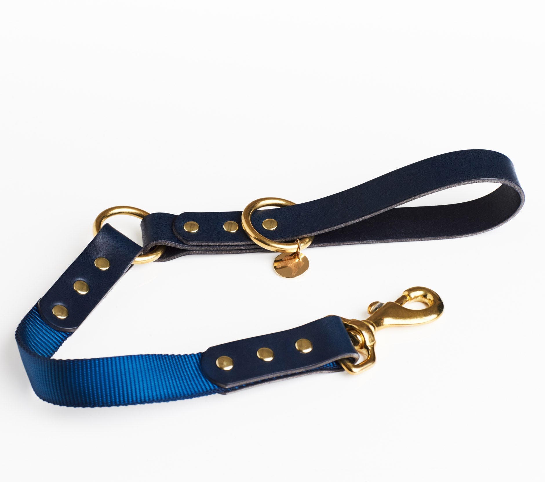Midnight Blue Leather and short length Navy Blue fabric dog lead with solid brass hardware and a connecting brass O ring at handle.
